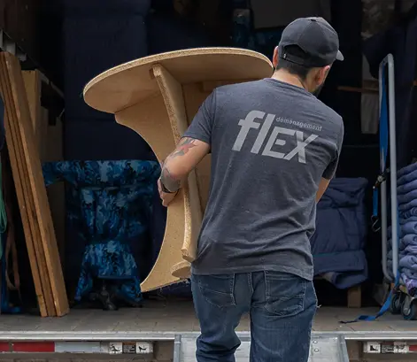 Flex moving truck heading out on a long-distance move from Montreal, priced by weight